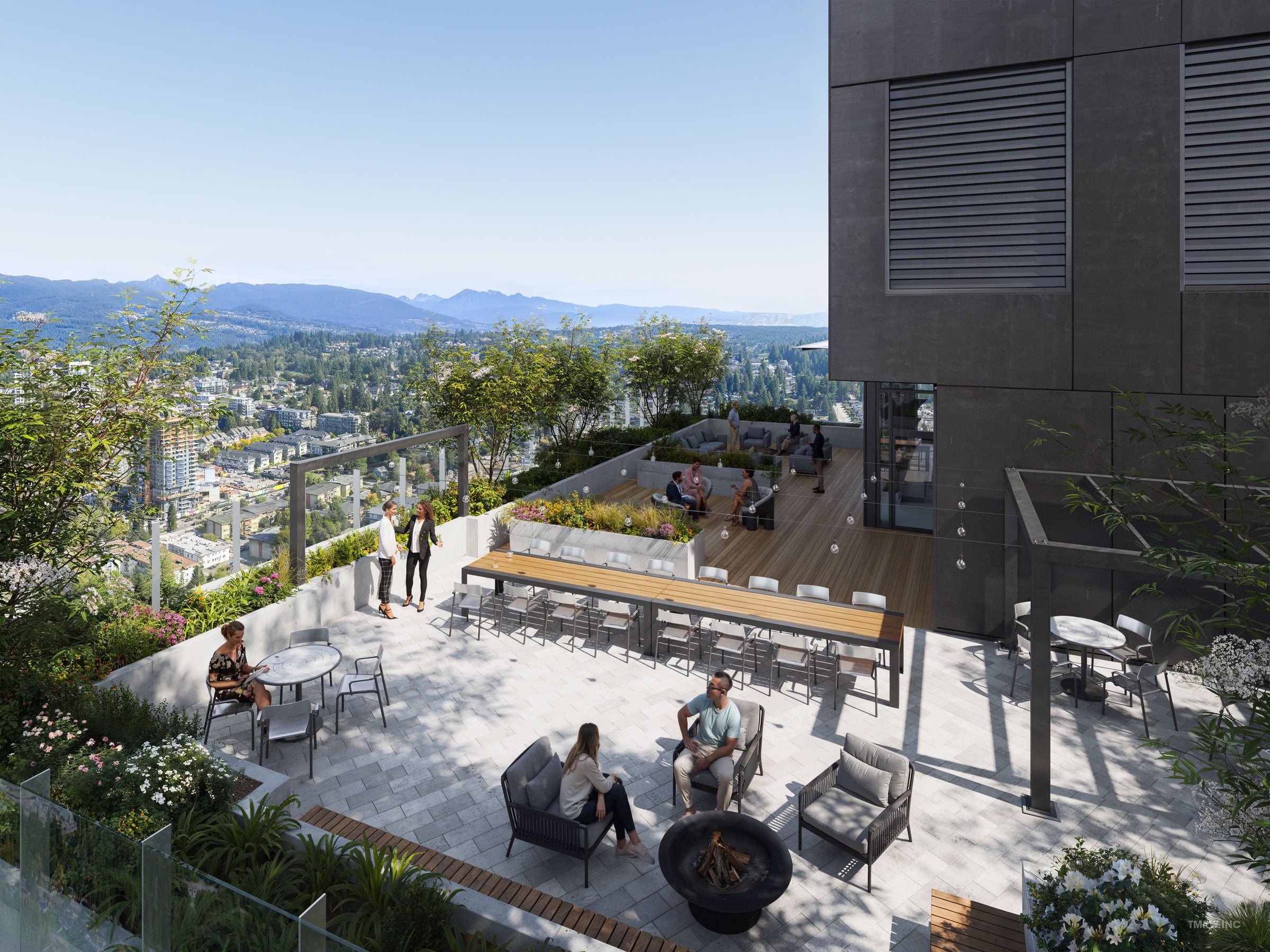 Outdoor terrace with a long dining table under a pergola