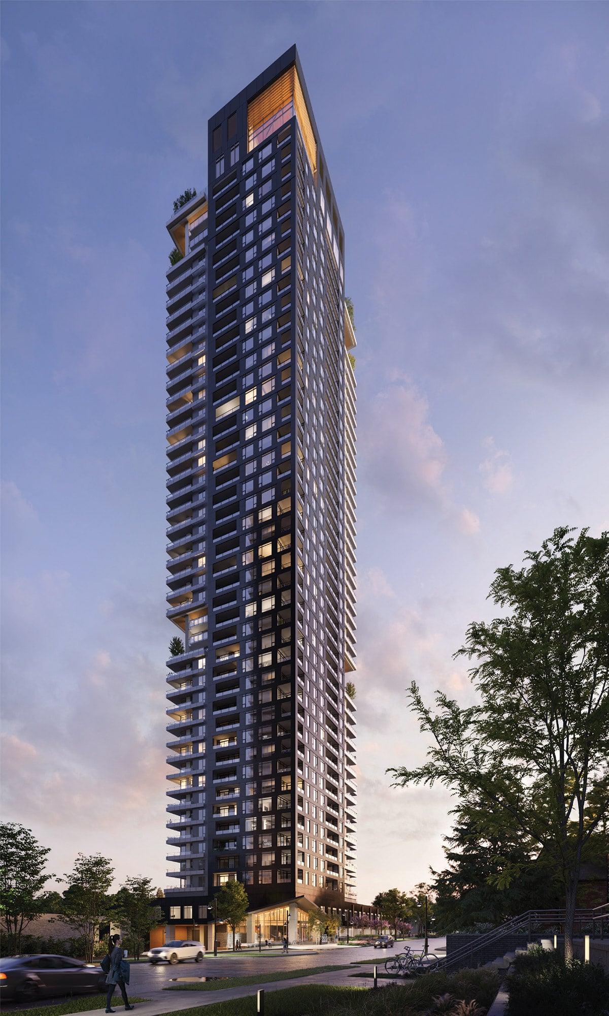 The BAND tower at dusk, with lit windows and planted terraces