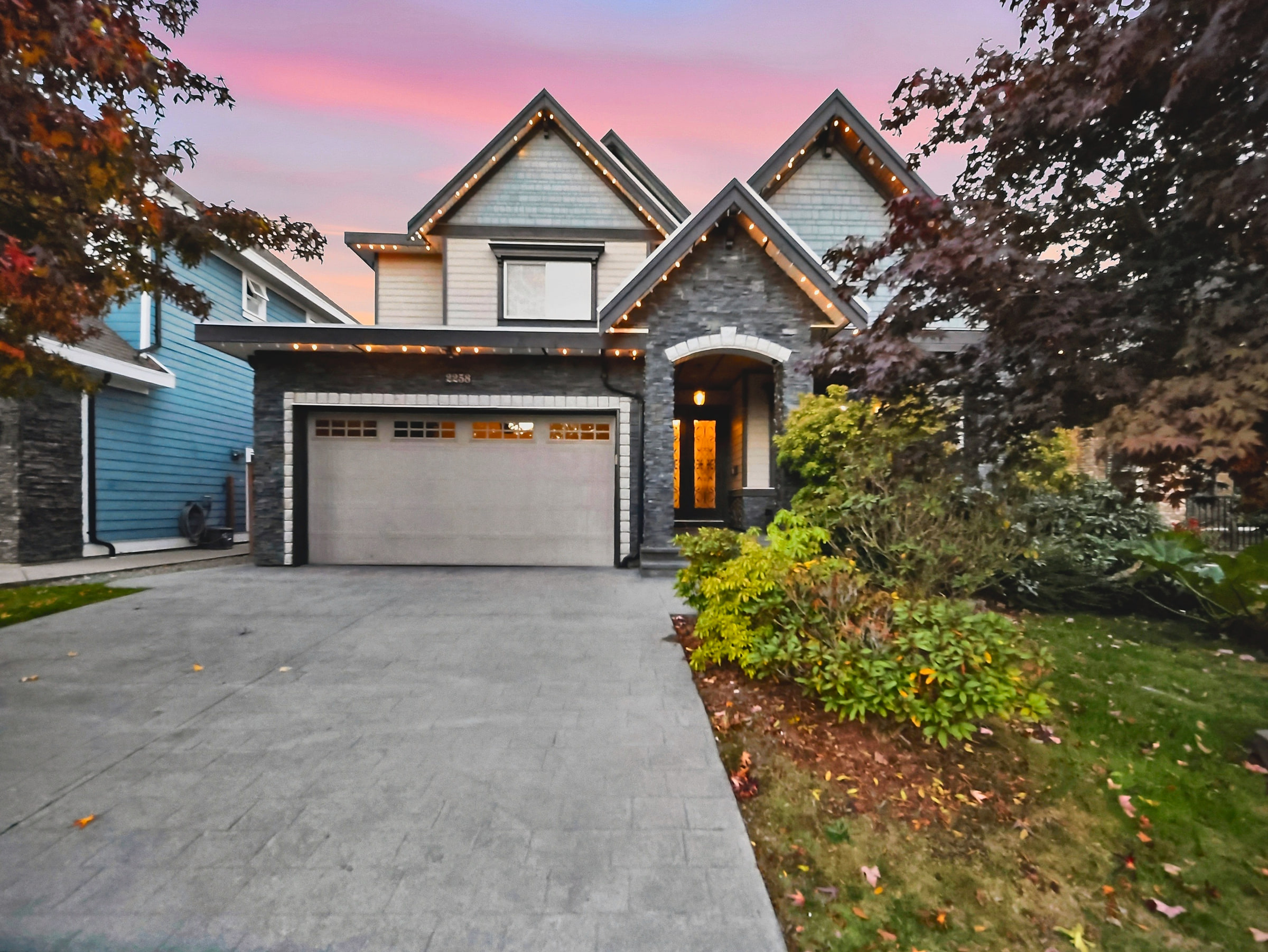 Front facade of 2258 Madrona Place at sunset